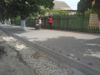 Продолжаются работы по укладке тротуарной плитки на ул.Третьякова(фоторепортаж)